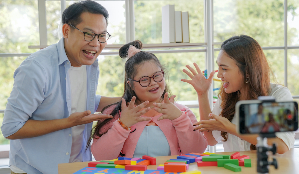 Down syndrome happy family,